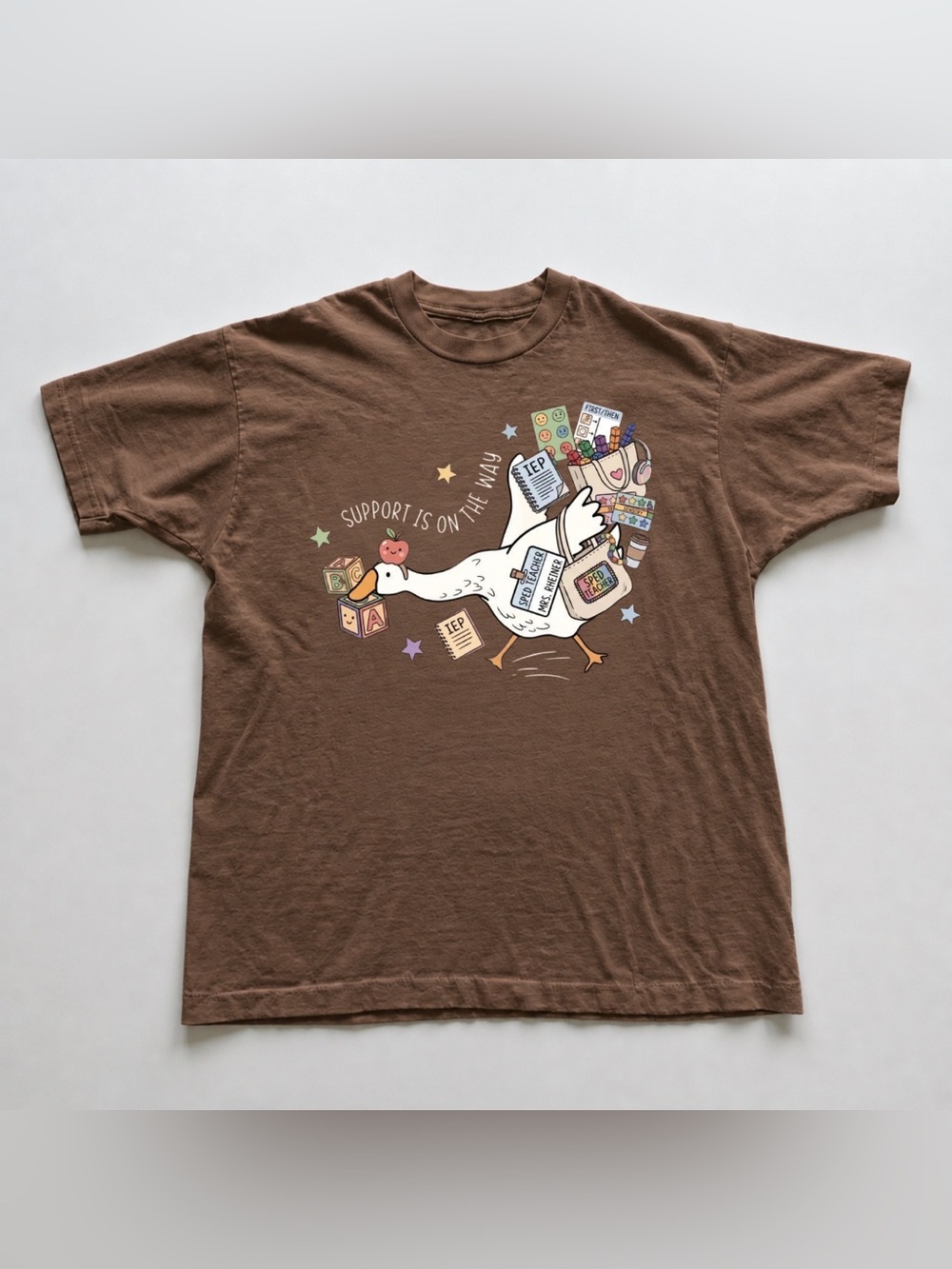 Brownsavana Tee with Playful Goose and School Supply Graphic